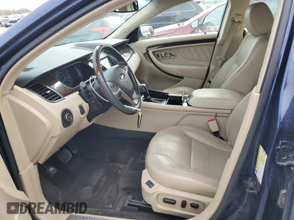 2017 Ford Taurus Limited with VIN 1FAHP2F81HG128215, listed as a Copart auction lot 51997725 with 99,728 mi miles and Salvage Title. Bid and sale history available at DreamBid. Image 7.