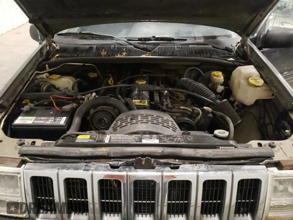 1997 Jeep Grand Cherokee Laredo с VIN 1J4GZ58S3VC508180, выставлен на аукционе Copart как лот 54856525 с пробегом 214 845 миль миль и На запчасти • Non repairable. История ставок и продаж доступна на DreamBid. Изображение 12.