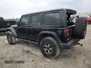 2019 Jeep Wrangler Unlimited Rubicon with VIN 1C4HJXFN6KW665805, listed as a Copart auction lot 45424005 with 141,007 mi miles and Salvage title. Bid and sale history available at DreamBid. Image 2.