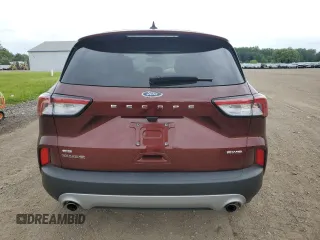 2021 Ford Escape SE z VIN 1FMCU9G6XMUA97492, wystawiony jako Copart lot #59129685 z przebiegiem 27 028 mil mil oraz Szkoda całkowita • Salvage title. Historia ofert i sprzedaży dostępna na DreamBid. Obrazek 6.