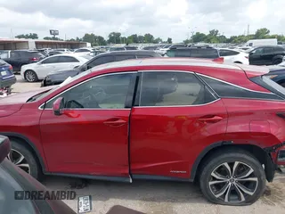2020 Lexus RX 450h с VIN 2T2HGMDA8LC056606, выставлен на аукционе IAAI как лот 42351287 с пробегом 99 192 миль миль и . История ставок и продаж доступна на DreamBid. Изображение 15.