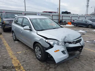 2010 Hyundai Elantra Touring GLS with VIN KMHDB8AE2AU072408, listed as a IAAI auction lot 41401227 with 113,769 mi miles. Bid and sale history available at carsss.com. Image 1.