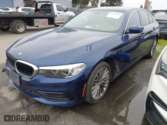 2019 BMW 5 Series 530e iPerformance with VIN WBAJA9C59KB389898, listed as a IAAI auction lot 41479595 with 90,965 mi miles. Bid and sale history available at carsss.com. Image 17.