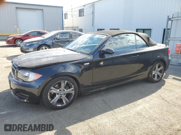 2009 BMW 1 Series 128i with VIN WBAUN13529VH81121, listed as a Copart auction lot 77849094 with 30,756 mi miles and Salvage Title. Bid and sale history available at DreamBid. Image 1.