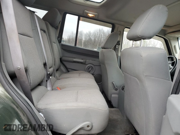 2007 Jeep Commander Sport z VIN 1J8HG48P97C622153, wystawiony jako Copart lot #50291165 z przebiegiem 113 516 mil mil oraz Szkoda całkowita • Salvage title. Historia ofert i sprzedaży dostępna na DreamBid. Obrazek 11.