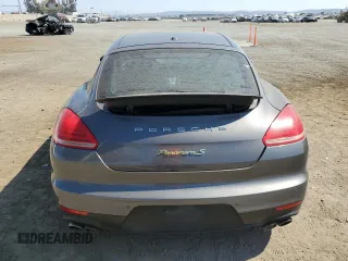 2014 Porsche Panamera S E-Hybrid z VIN WP0AD2A78EL044818, wystawiony jako Copart lot #65864484 z przebiegiem 141 423 mil mil oraz Szkoda całkowita • Salvage title. Historia ofert i sprzedaży dostępna na DreamBid. Obrazek 6.