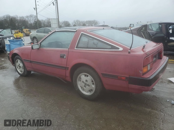 1985 Nissan 300ZX z VIN JN1HZ14S2FX092175, wystawiony jako Copart lot #45348155 z przebiegiem 162 305 mil mil oraz Czysty tytuł • Clean title. Historia ofert i sprzedaży dostępna na DreamBid. Obrazek 2.