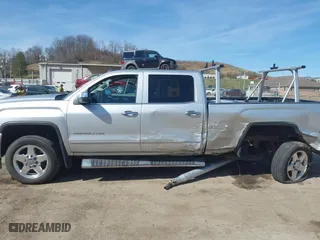 2015 GMC Sierra 2500HD Denali with VIN 1GT120EG3FF135791, listed as a IAAI auction lot 41854102 with 93,186 mi miles. Bid and sale history available at carsss.com. Image 14.