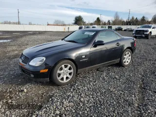 1999 Mercedes-Benz SLK-Class with VIN WDBKK47F7XF142078, listed as a Copart auction lot 43598095 with 61,995 mi miles and Salvage Title. Bid and sale history available at carsss.com. Image 1.