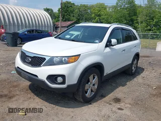 2013 Kia Sorento EX with VIN 5XYKUDA61DG384037, listed as a IAAI auction lot 42449718 with 173,688 mi miles and . Bid and sale history available at DreamBid. Image 2.