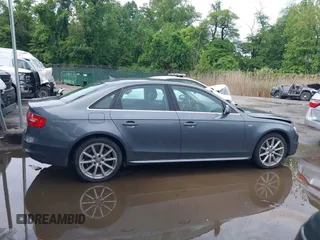 2015 Audi A4 Premium Plus z VIN WAUFFAFL5FN018440, wystawiony jako IAAI lot #42230870 z przebiegiem 135 275 mil mil oraz . Historia ofert i sprzedaży dostępna na DreamBid. Obrazek 13.