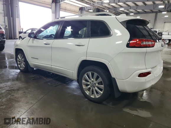 2016 Jeep Cherokee Overland with VIN 1C4PJLJB0GW302604, listed as a Copart auction lot 70624834 with 96,394 mi miles and Salvage title. Bid and sale history available at DreamBid. Image 2.