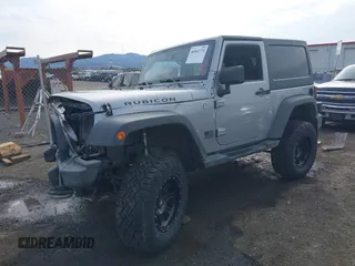 2013 Jeep Wrangler Rubicon 10th Anniversary with VIN 1C4BJWCG8DL639121, listed as a IAAI auction lot 40561773 with 56,023 mi miles and . Bid and sale history available at DreamBid. Image 18.