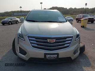 2017 Cadillac XT5 Premium Luxury FWD z VIN 1GYKNCRSXHZ164468, wystawiony jako IAAI lot #40314503 z przebiegiem 94 008 mil mil oraz . Historia ofert i sprzedaży dostępna na DreamBid. Obrazek 12.