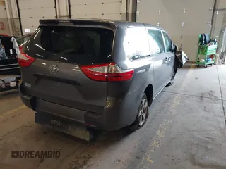 2015 Toyota Sienna L with VIN 5TDZK3DCXFS567507, listed as a IAAI auction lot 41205670 with 104,443 mi miles and . Bid and sale history available at DreamBid. Image 4.