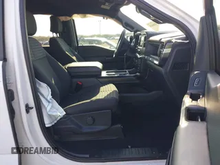 2023 Ford F-150 XL z VIN 1FTEW1CPXPKF87647, wystawiony jako IAAI lot #41486870 z przebiegiem 23 609 mil mil oraz . Historia ofert i sprzedaży dostępna na DreamBid. Obrazek 5.