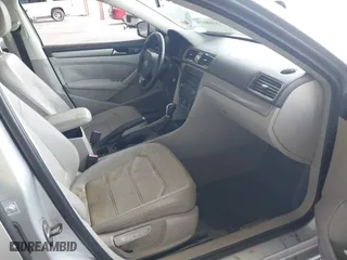 2014 Volkswagen Passat Wolfsburg Ed with VIN 1VWAS7A32EC036193, listed as a IAAI auction lot 41606595 with 77,536 mi miles. Bid and sale history available at carsss.com. Image 5.