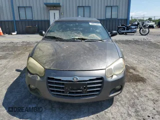 2005 Chrysler Sebring Touring z VIN 1C3EL55R55N625039, wystawiony jako Copart lot #58078465 z przebiegiem 158 906 mil mil oraz Tytuł czysty. Historia ofert i sprzedaży dostępna na DreamBid. Obrazek 5.