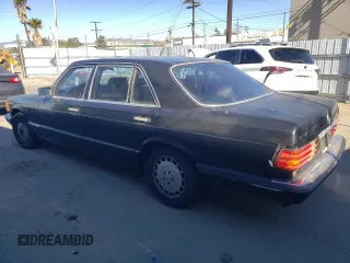 1989 Mercedes-Benz 560 with VIN WDBCA39E0KA446817, listed as a Copart auction lot 81615244 with 270,136 mi miles and Salvage Title. Bid and sale history available at DreamBid. Image 2.