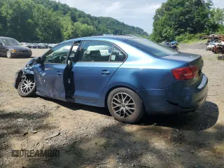 2015 Volkswagen Jetta S with VIN 3VW2K7AJ7FM222573, listed as a Copart auction lot 63015625 with 127,376 mi miles and Salvage title. Bid and sale history available at DreamBid. Image 2.