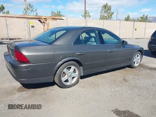 2002 Lincoln LS w/Base Pkg with VIN 1LNHM87A02Y706583, listed as a IAAI auction lot 41809363 with 131,313 mi miles. Bid and sale history available at carsss.com. Image 4.