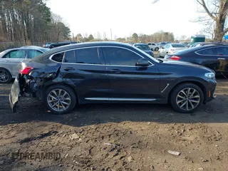 2019 BMW X4 xDrive30i with VIN 5UXUJ3C51KLG52460, listed as a IAAI auction lot 41906197 with 174,938 mi miles and . Bid and sale history available at DreamBid. Image 13.