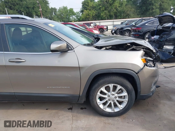 2019 Jeep Cherokee Latitude with VIN 1C4PJLCBXKD416644, listed as a IAAI auction lot 42261057 with 93,849 mi miles and . Bid and sale history available at DreamBid. Image 18.