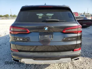 2020 BMW X5 sDrive40i with VIN 5UXCR4C0XL9C12704, listed as a Copart auction lot 49280385 with 84,872 mi miles and Clean Title. Bid and sale history available at carsss.com. Image 6.