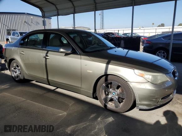 2005 BMW 5 Series 530i with VIN WBANA73535CR59463, listed as a Copart auction lot 67878994 with 147,052 mi miles and Salvage Title. Bid and sale history available at DreamBid. Image 4.