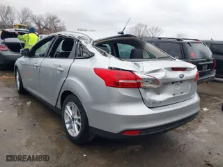 2018 Ford Focus SE with VIN 1FADP3F20JL306628, listed as a IAAI auction lot 41835004 with 28,070 mi miles. Bid and sale history available at carsss.com. Image 3.