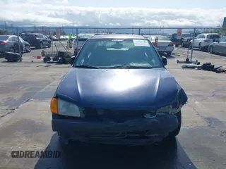1999 Mazda Protege DX z VIN JM1BJ2229X0189290, wystawiony jako IAAI lot #41796448 z przebiegiem 281 528 mil mil oraz . Historia ofert i sprzedaży dostępna na DreamBid. Obrazek 13.