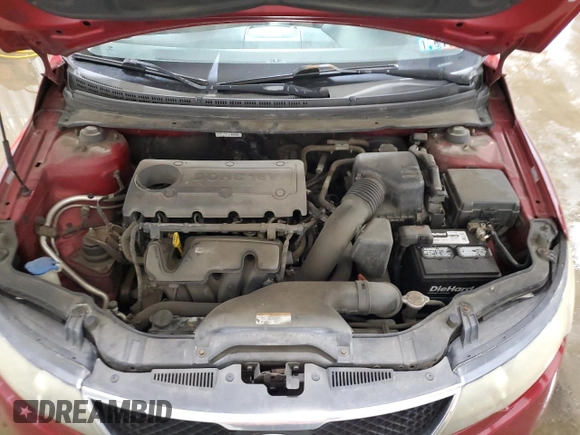 2010 Kia Forte EX z VIN KNAFU4A22A5236916, wystawiony jako Copart lot #56112275 z przebiegiem 186 959 mil mil oraz Szkody całkowita. Historia ofert i sprzedaży dostępna na DreamBid. Obrazek 11.
