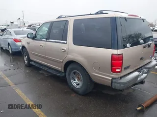 1997 Ford Expedition XLT z VIN 1FMEU17L2VLB53786, wystawiony jako IAAI lot #41912417 z przebiegiem 198 435 mil mil oraz . Historia ofert i sprzedaży dostępna na DreamBid. Obrazek 3.