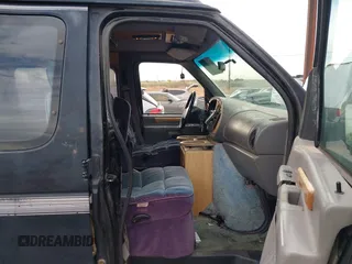1997 Ford Econoline Commercial with VIN 1FDEE1460VHB16721, listed as a IAAI auction lot 40968310 with 261,169 mi miles. Bid and sale history available at carsss.com. Image 5.