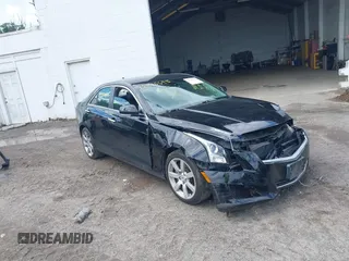 2014 Cadillac ATS Luxury RWD z VIN 1G6AB5RAXE0149887, wystawiony jako IAAI lot #42330695 z przebiegiem 94 045 mil mil oraz . Historia ofert i sprzedaży dostępna na DreamBid. Obrazek 1.