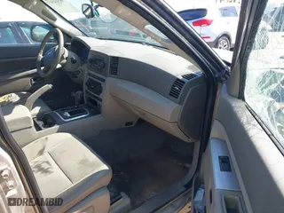 2005 Jeep Grand Cherokee Laredo with VIN 1J4HR48N35C647637, listed as a IAAI auction lot 38514345 with 167,342 mi miles. Bid and sale history available at carsss.com. Image 5.