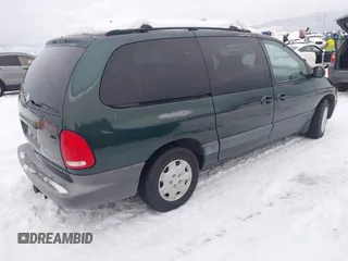 1999 Dodge Grand Caravan with VIN 1B4GT44LXXB609853, listed as a IAAI auction lot 41299906 with 211,337 mi miles and . Bid and sale history available at DreamBid. Image 4.