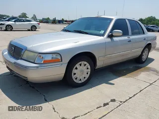 2004 Mercury Grand Marquis GS z VIN 2MEFM74W54X673359, wystawiony jako IAAI lot #42441171 z przebiegiem 117 442 mil mil oraz . Historia ofert i sprzedaży dostępna na DreamBid. Obrazek 2.