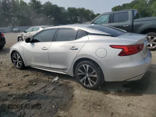 2018 Nissan Maxima SL with VIN 1N4AA6AP4JC363584, listed as a Copart auction lot 59315565 with 126,627 mi miles and Salvage title. Bid and sale history available at DreamBid. Image 2.