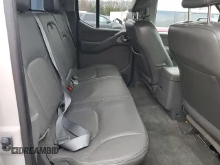 2014 Nissan Frontier SL z VIN 1N6AD0FV2EN720242, wystawiony jako Copart lot #86976214 z przebiegiem 118 581 mil mil oraz Szkoda całkowita • Salvage title. Historia ofert i sprzedaży dostępna na DreamBid. Obrazek 10.
