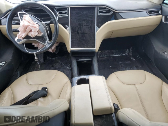 2014 Tesla Model S 60 with VIN 5YJSA1S12EFP29885, listed as a Copart auction lot 59769215 with Not provided miles and Salvage title. Bid and sale history available at DreamBid. Image 8.