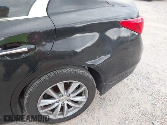 2015 Infiniti Q50 Premium z VIN JN1BV7ARXFM410177, wystawiony jako IAAI lot #41936999 z przebiegiem 129 123 mil mil oraz . Historia ofert i sprzedaży dostępna na DreamBid. Obrazek 6.