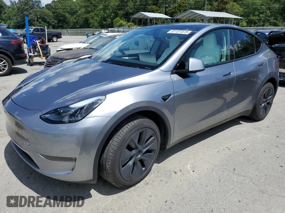 2024 Tesla Model Y Long Range z VIN 7SAYGDEE7RA308338, wystawiony jako Copart lot #61137375 z przebiegiem 19 501 mil mil oraz Szkoda całkowita • Salvage title. Historia ofert i sprzedaży dostępna na DreamBid. Obrazek 1.