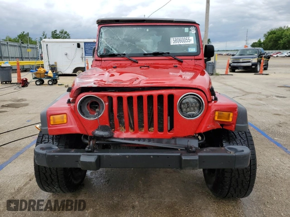 2005 Jeep Wrangler Sport z VIN 1J4FA49S75P317995, wystawiony jako Copart lot #58060055 z przebiegiem 189 332 mil mil oraz Szkoda całkowita • Salvage title. Historia ofert i sprzedaży dostępna na DreamBid. Obrazek 5.