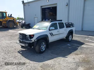 2013 Toyota Tacoma with VIN 3TMLU4EN9DM113137, listed as a IAAI auction lot 41709140 with 57,704 mi miles and . Bid and sale history available at DreamBid. Image 18.