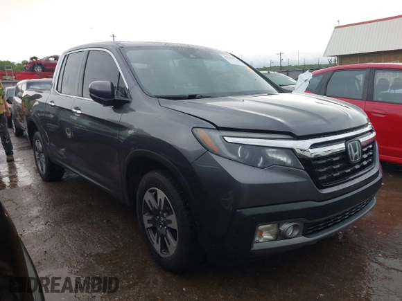 2018 Honda Ridgeline RTL-E with VIN 5FPYK3F74JB012181, listed as a IAAI auction lot 42143197 with 117,520 mi miles and . Bid and sale history available at DreamBid. Image 1.
