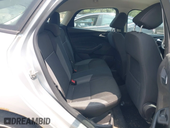 2014 Ford Focus SE z VIN 1FADP3K28EL125403, wystawiony jako IAAI lot #42494248 z przebiegiem 129 244 mil mil oraz . Historia ofert i sprzedaży dostępna na DreamBid. Obrazek 8.