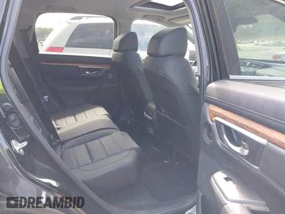 2020 Honda CR-V Touring with VIN 7FART6H96LE023782, listed as a IAAI auction lot 42053948 with 56,814 mi miles and . Bid and sale history available at DreamBid. Image 8.