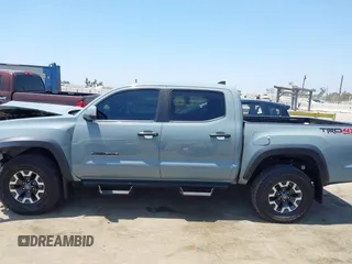 2022 Toyota Tacoma SR with VIN 3TYCZ5AN0NT104300, listed as a IAAI auction lot 42652503 with 18,071 mi miles and . Bid and sale history available at DreamBid. Image 15.