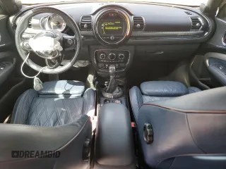 2016 MINI Clubman z VIN WMWLN5C50G2E29737, wystawiony jako Copart lot #50459135 z przebiegiem 129 940 mil mil oraz Szkody całkowita. Historia ofert i sprzedaży dostępna na DreamBid. Obrazek 8.